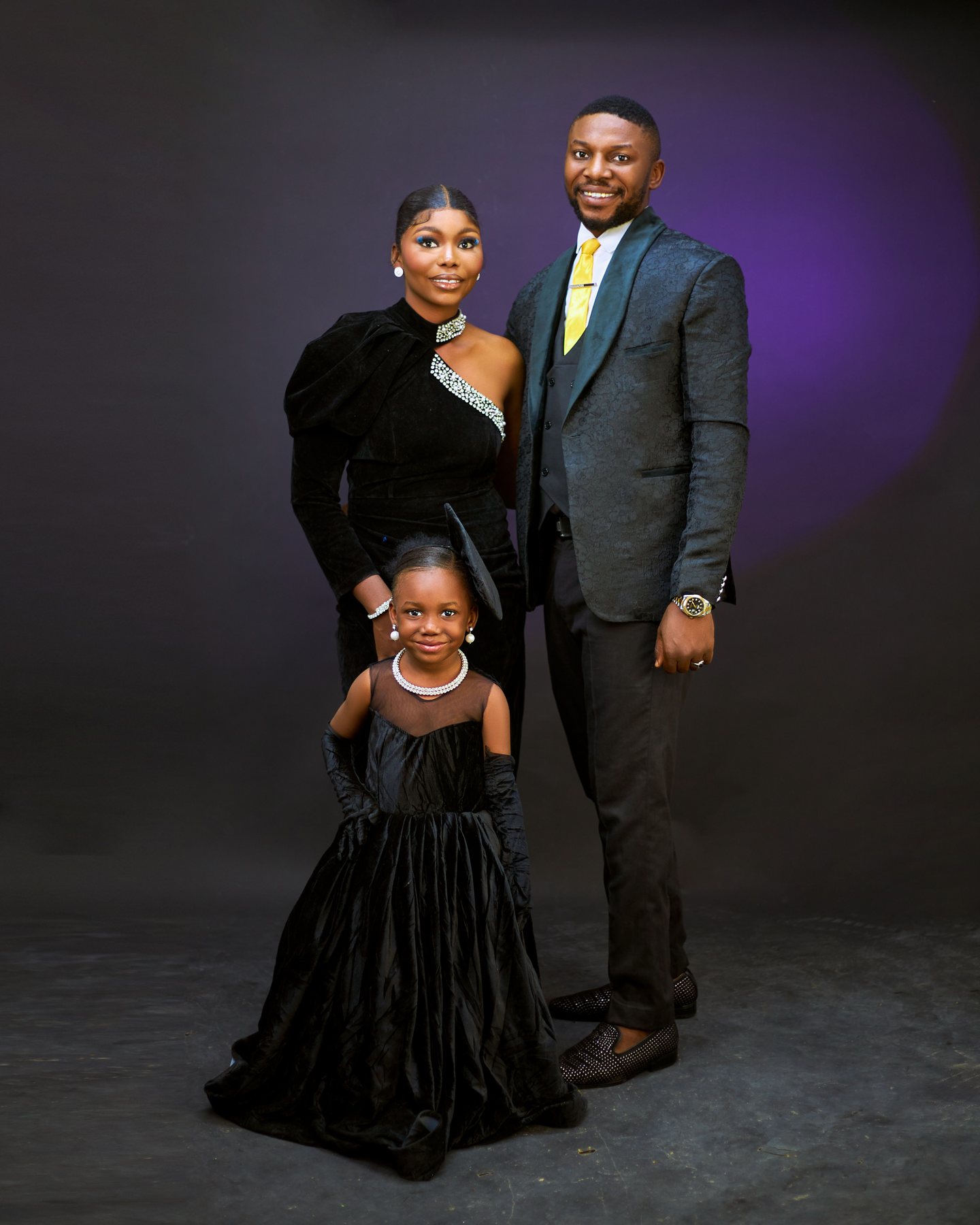 A family together in formal attire
